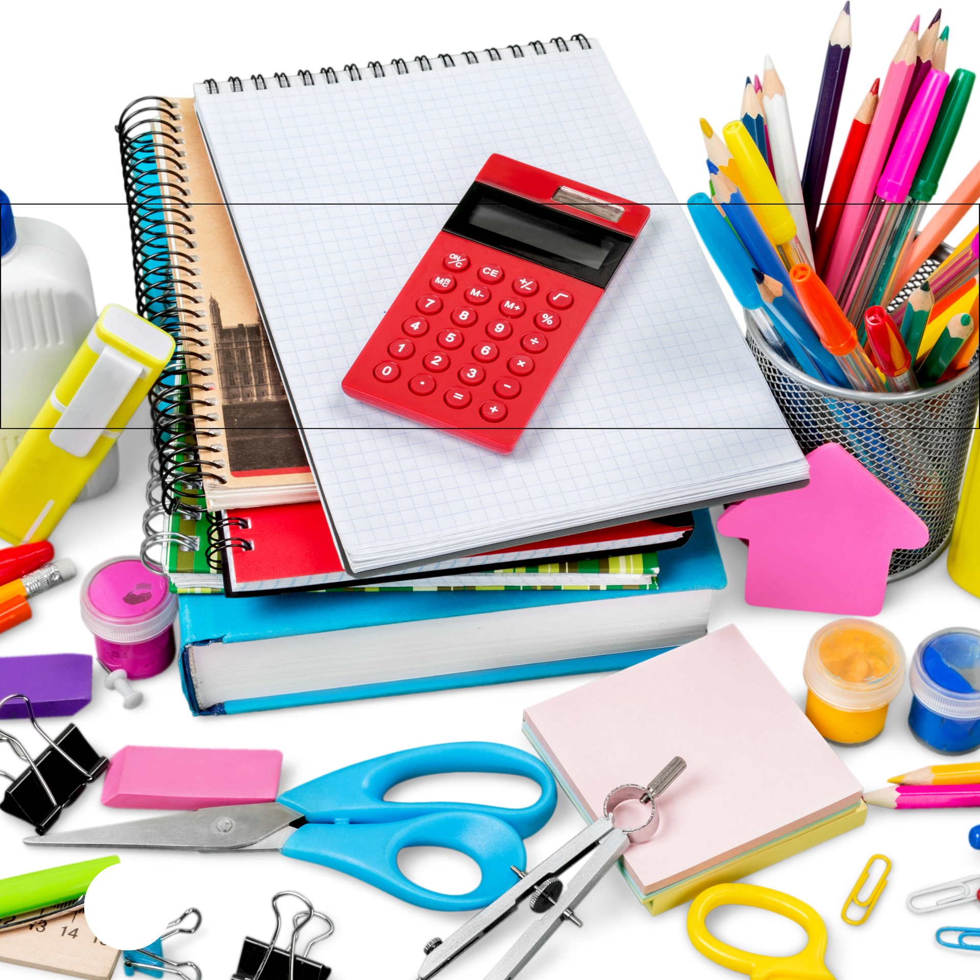 Colorful stationary supplies scattered on a table including notebooks, scissors, and a calculator.