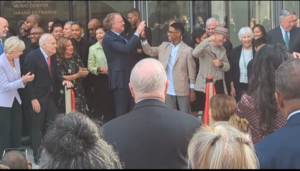 St. Louis Symphony Music Director Stéphane Denève gives a high five to GCAA sophomore Denim Browder following the ribbon-cutting ceremony