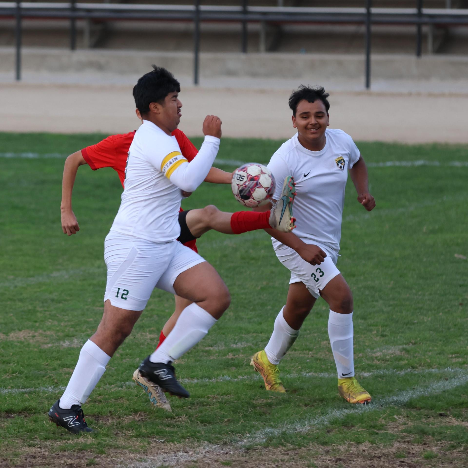 Junior Varisty boys playing soccer against Kingsburg
