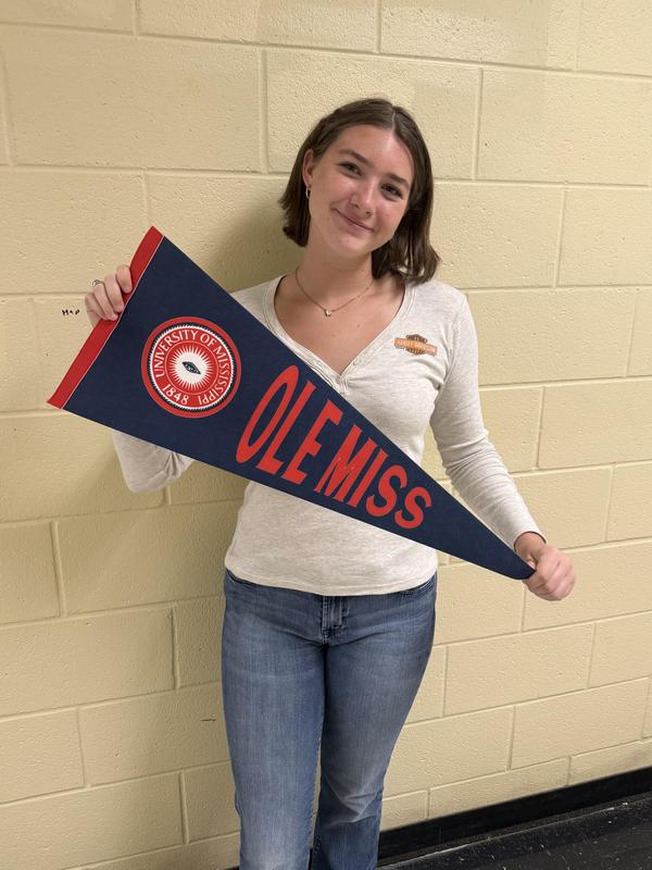 Lexi holding Ole Miss pennant