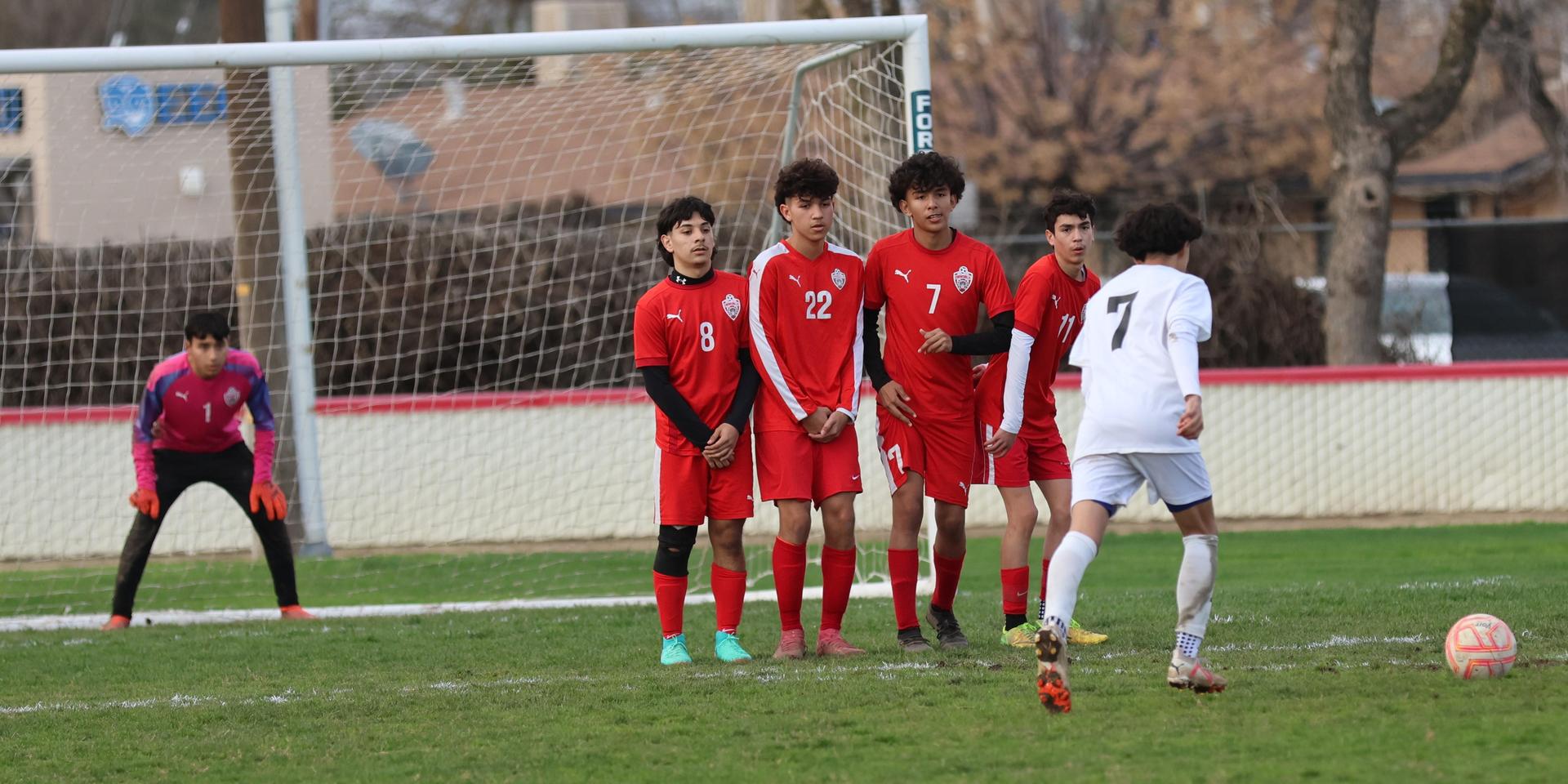 junior varsity boys playing soccer against washington union