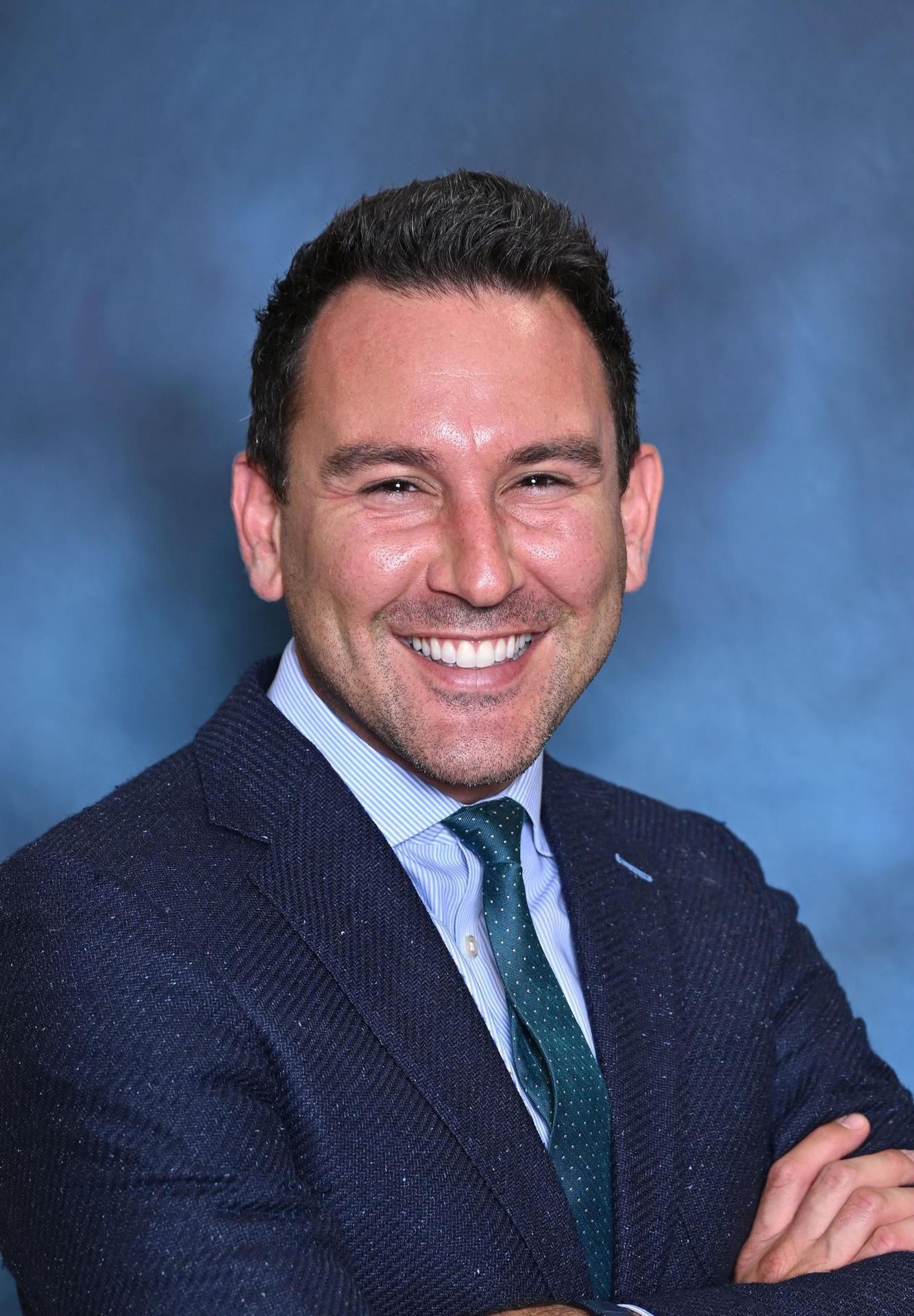 Mr. Ephi Strazynski, Executive Director