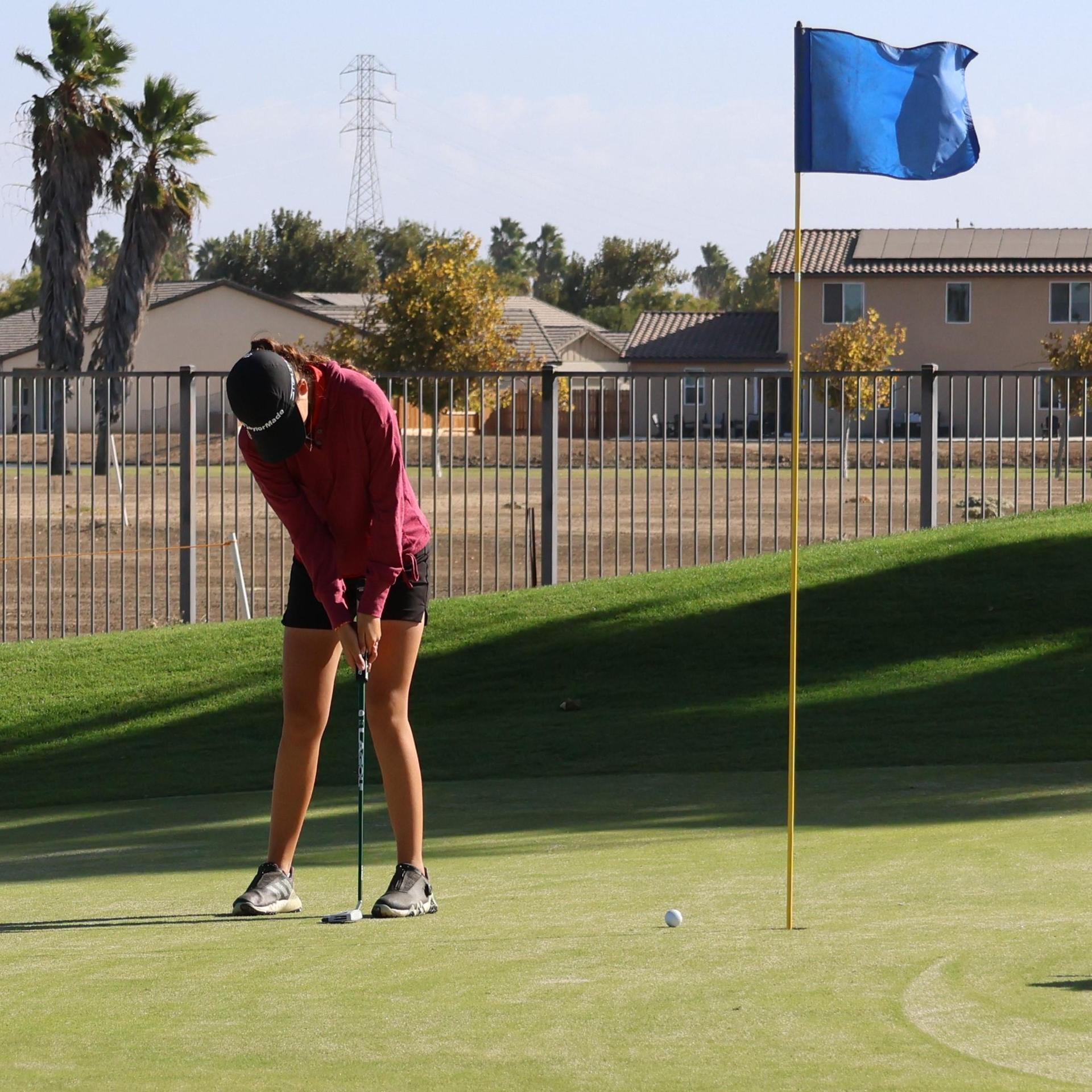 Girls golfers in action at the championships