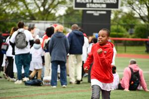 Student running on the track
