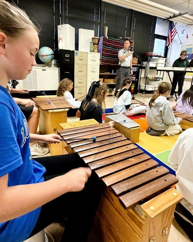 Student playing instrument
