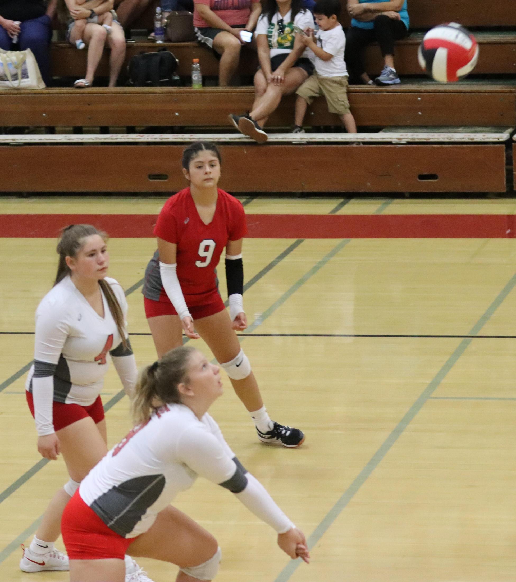 junior varsity girls playing volleyball against Mendota
