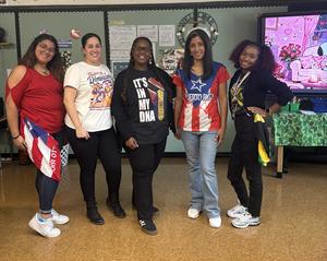 Staff wearing clothing to represent their culture