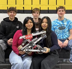 The high school team with their robot