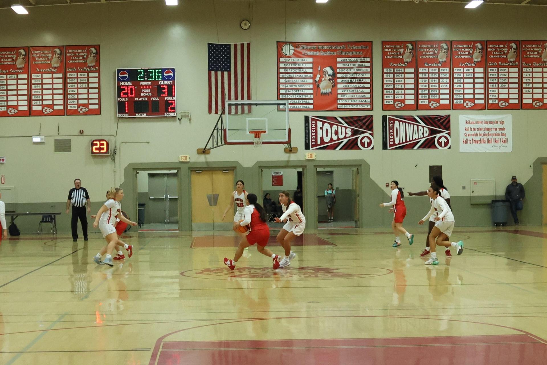 Varsity Girls Basketball playing against Firebaugh