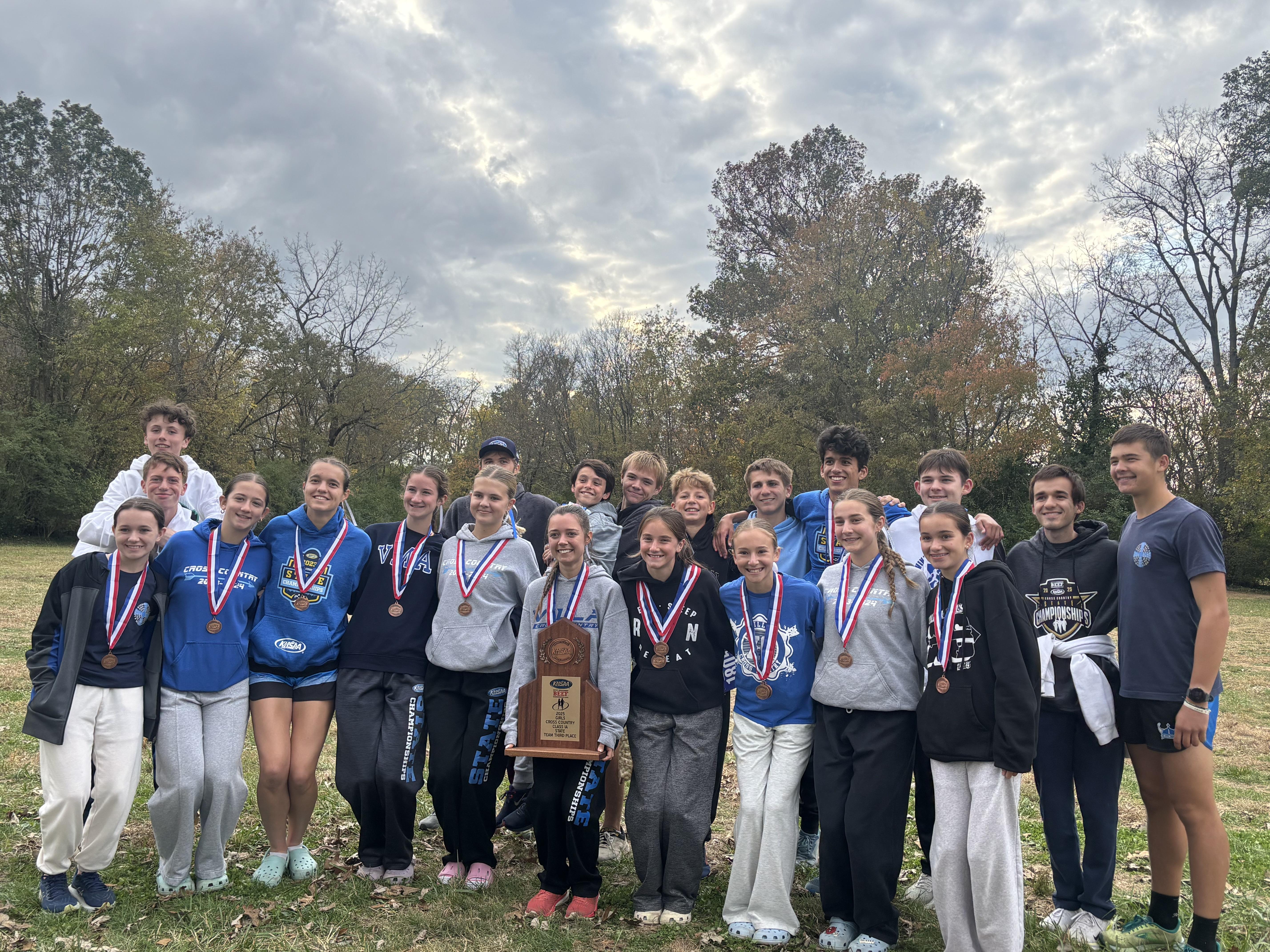 Cross Country Teams with trophy at State
