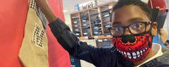 Students working on Christmas door decorations