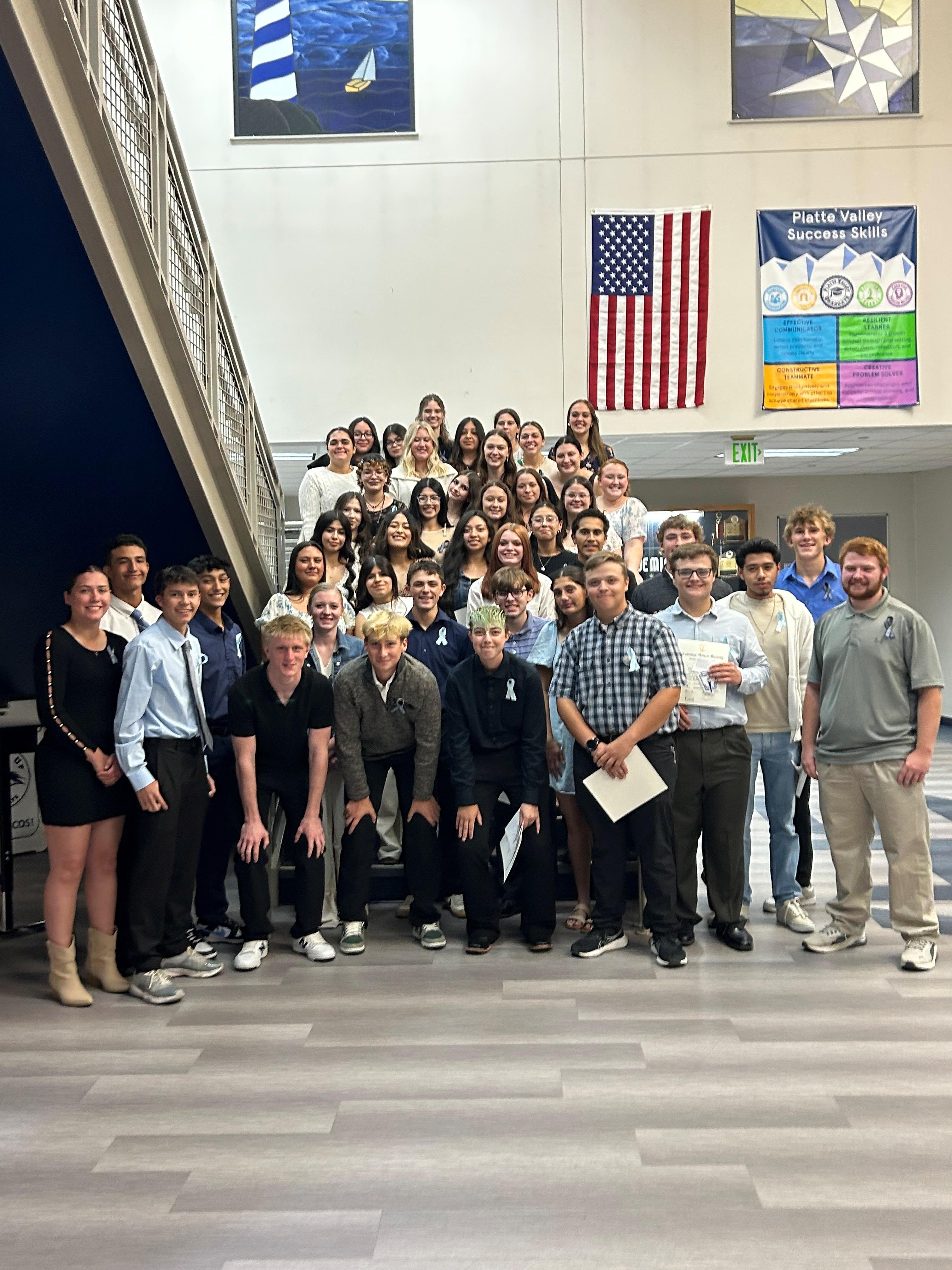 NHS members pose together for a picture