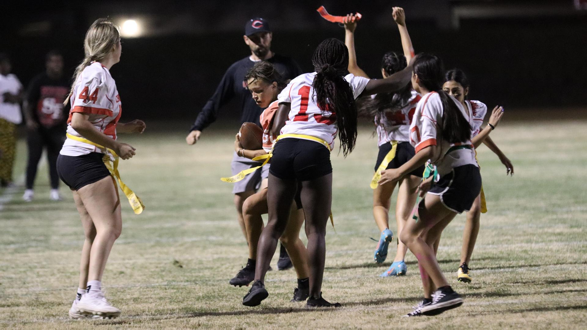 girls playing flag football