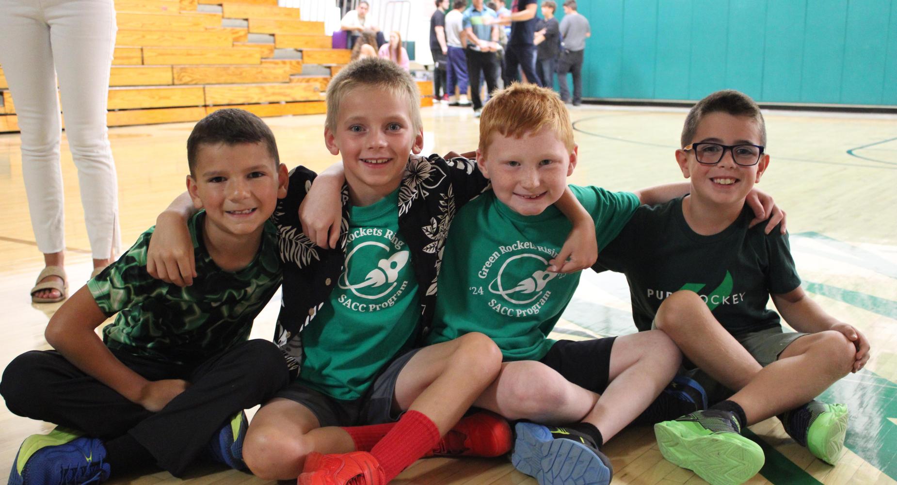 MCS students sit in gym