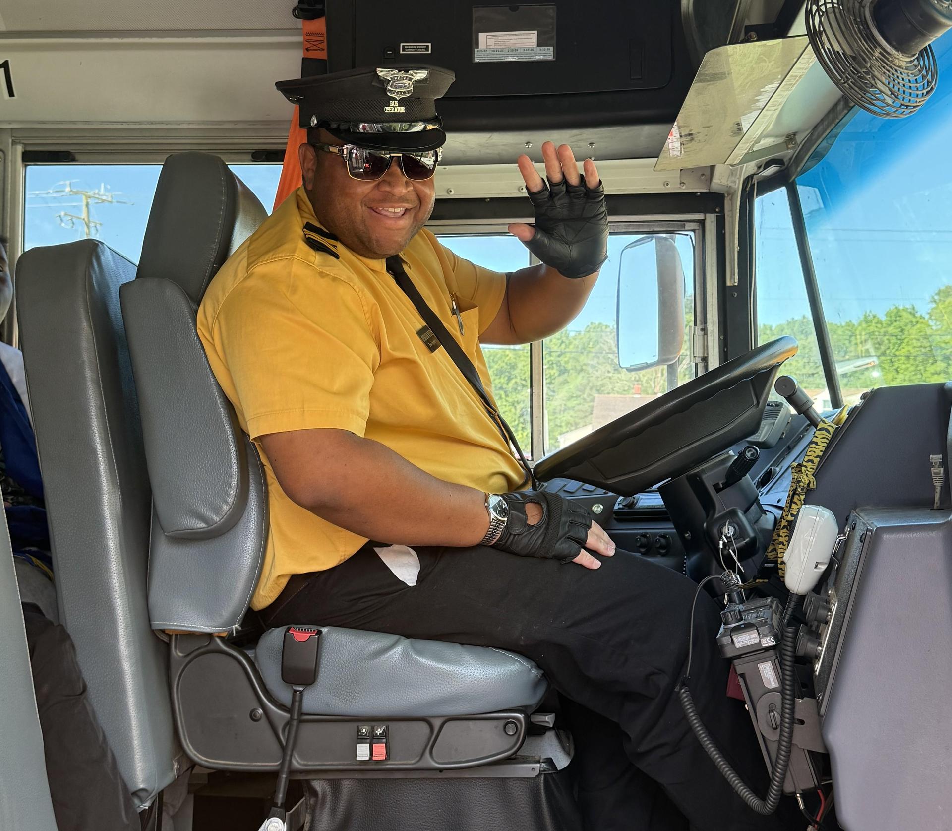 bus driver waving