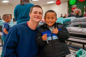 westwind student smiling with lubbock firefighter