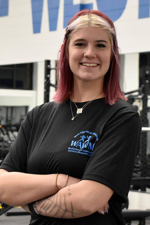 Bllonde and red haired personal trainer named Emily Viduski