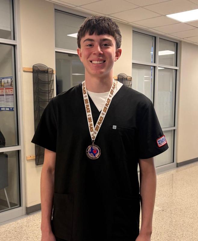Gabriel Garcia with his medal from the Regional History Fair