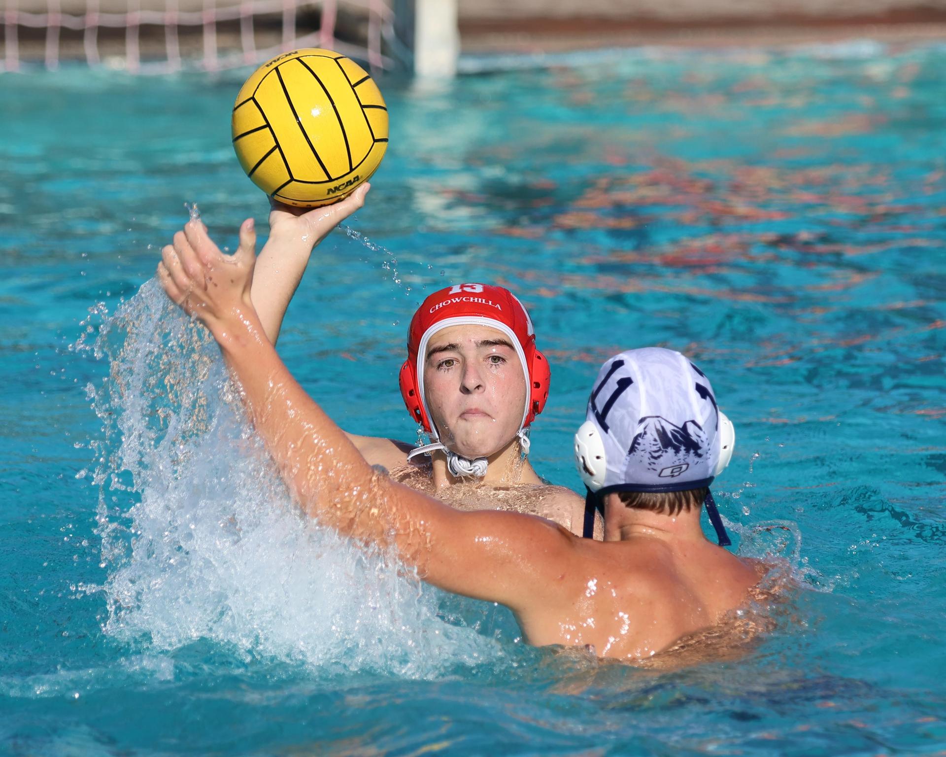 Boys playing water polo against Yosemite