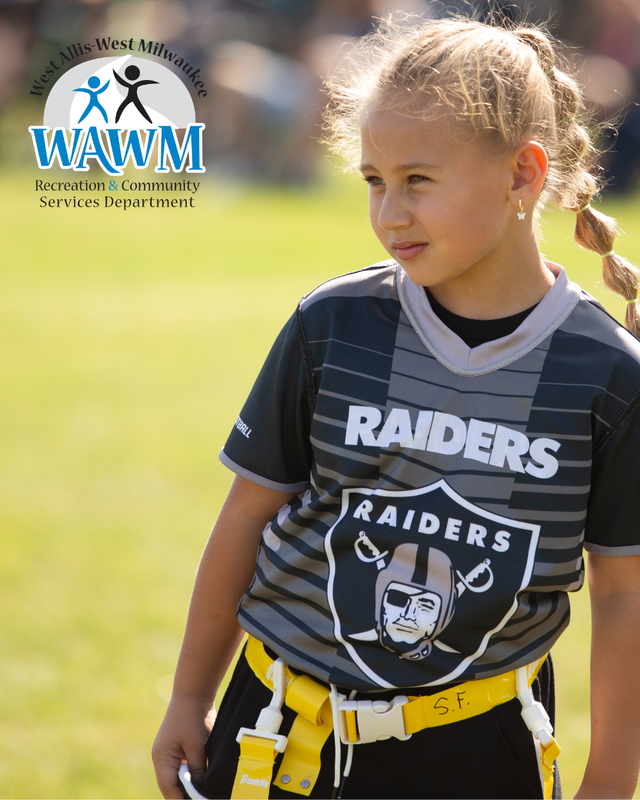 Photo of girl in Raiders jersey on football field