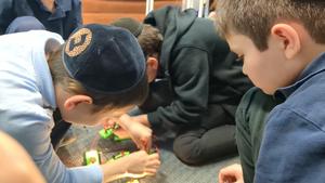 Third grade boys working with circuits.