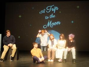 Several students work on a scene for "A Trip to the Moon" performances.