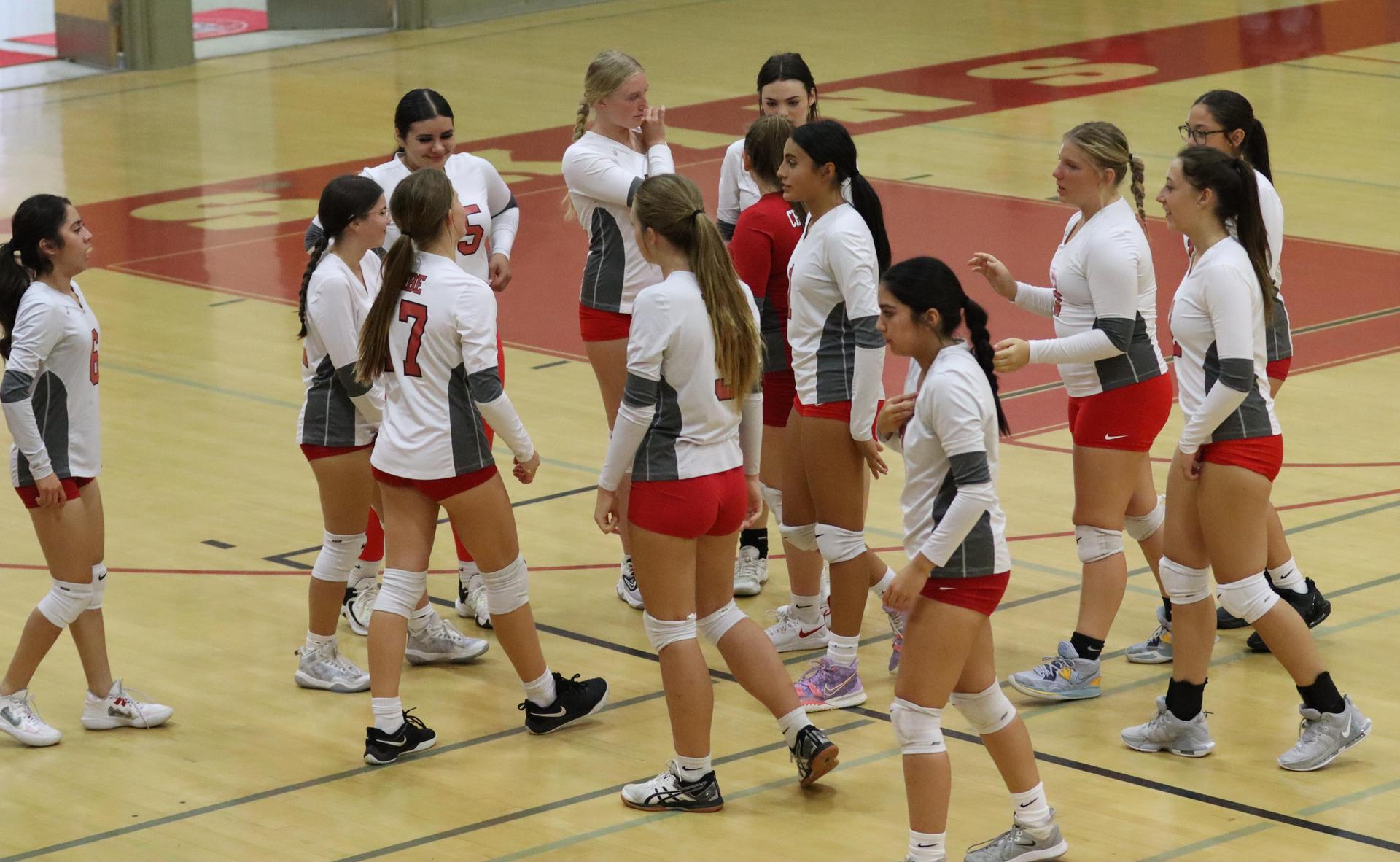 junior varsity girls playing volleyball against Liberty