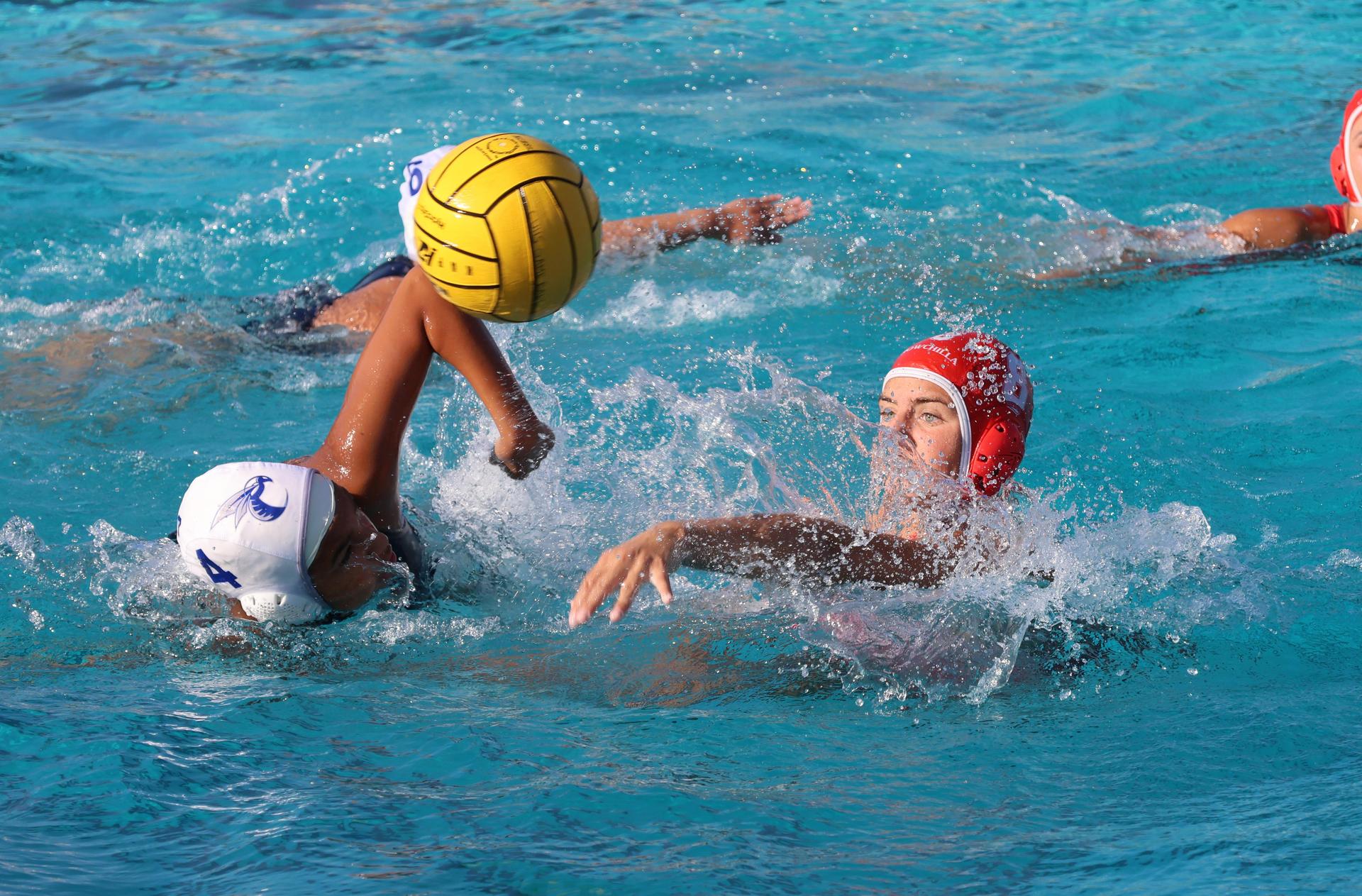 girls playing water polo against Sanger West