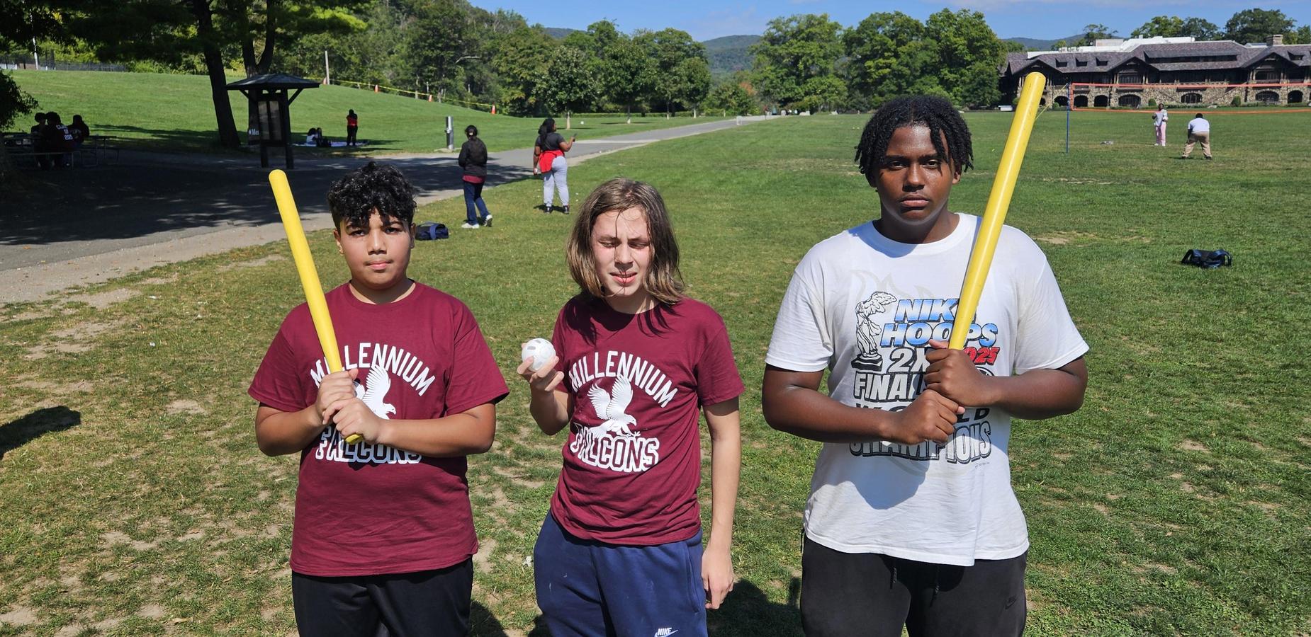 Students pose for community building trip.