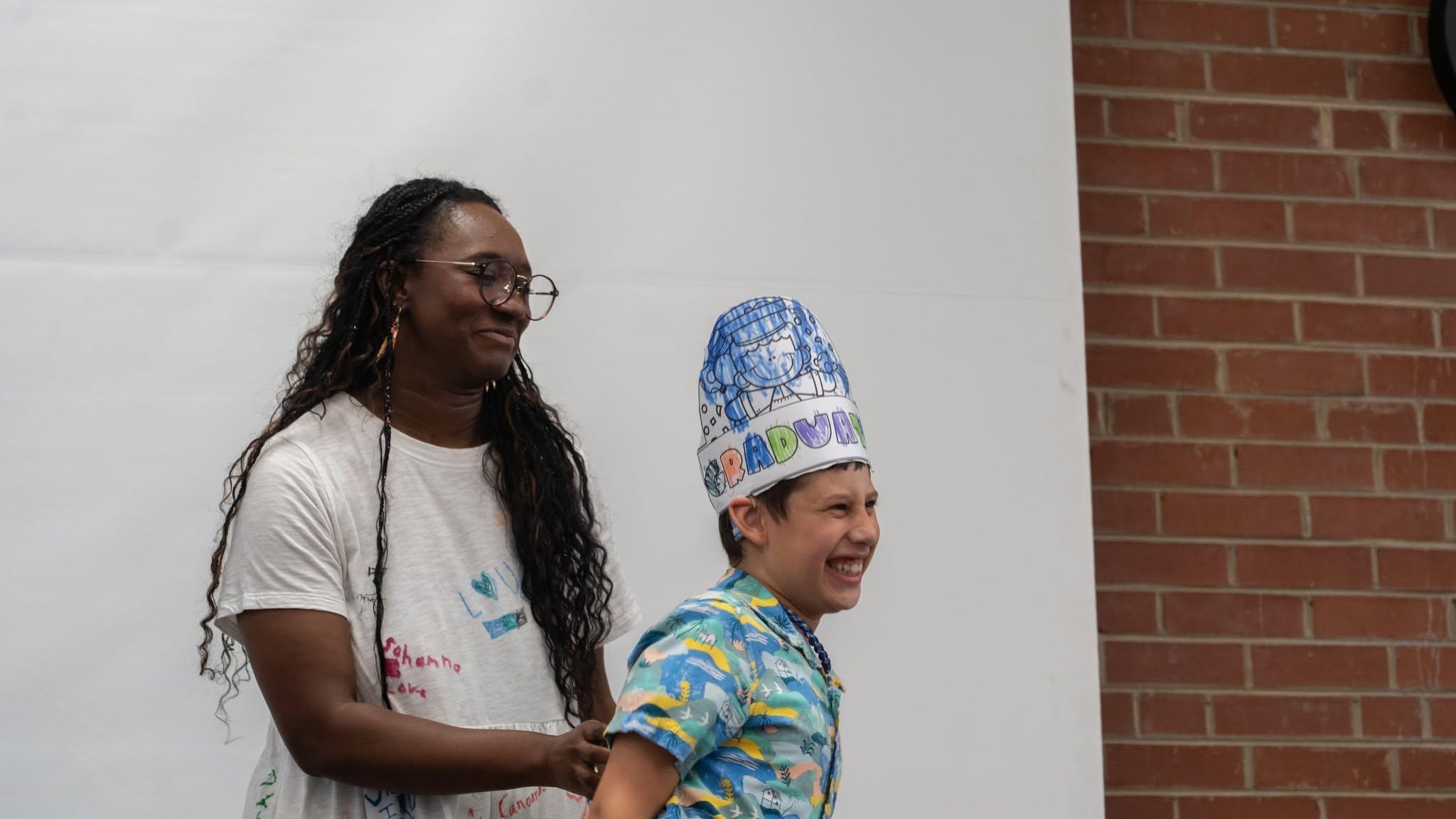 Teacher and student with a crown