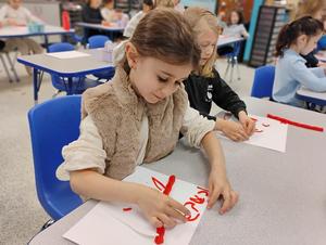 girls make their name out of twizzlers