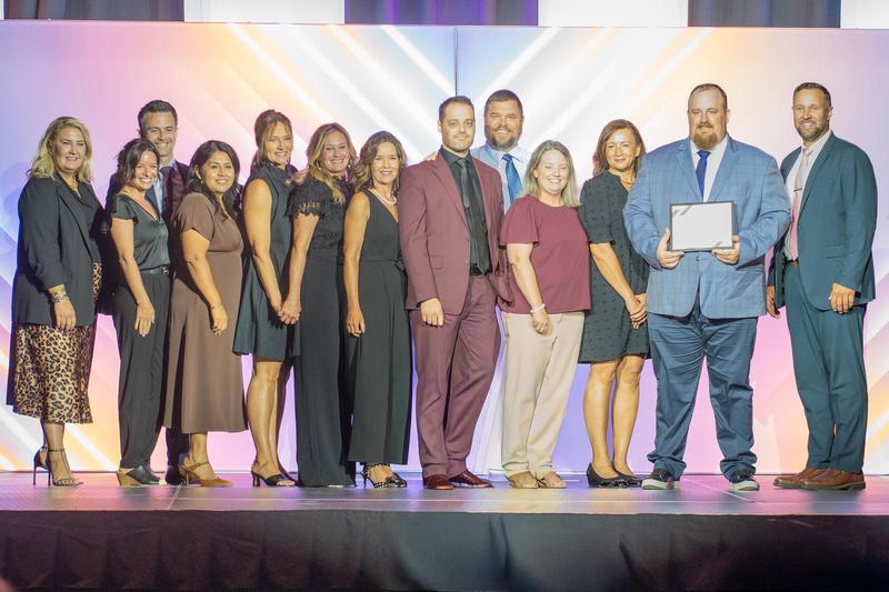MATC Staff on Stage Getting Award