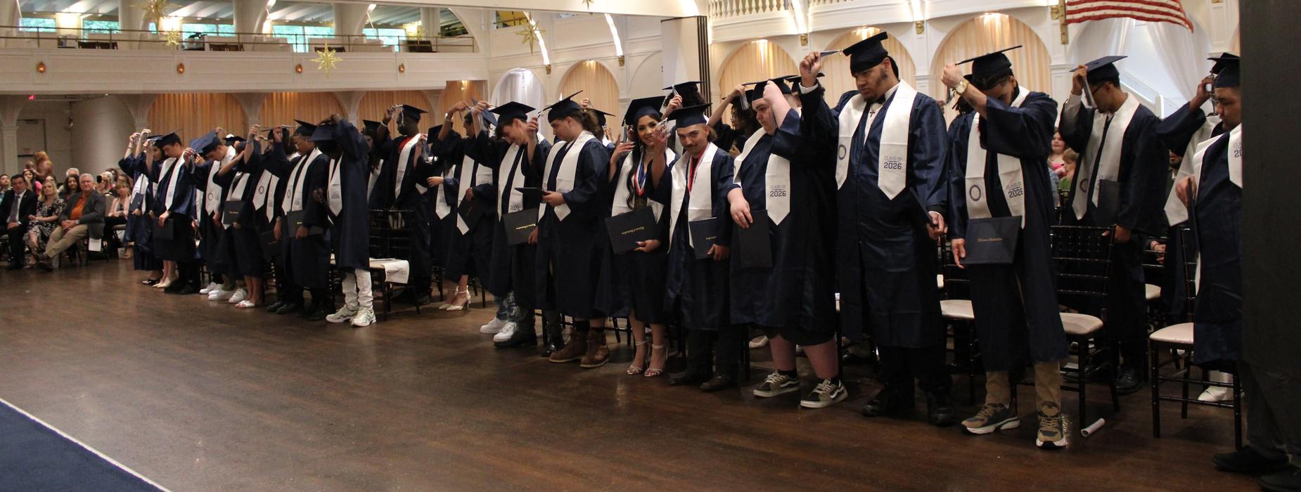 AES students turning their tassels.
