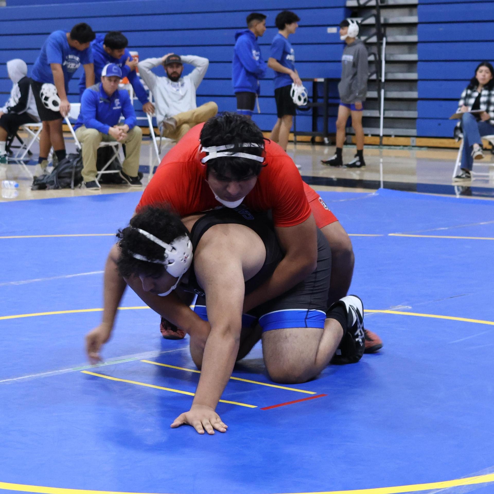 wrestlers in action at parlier