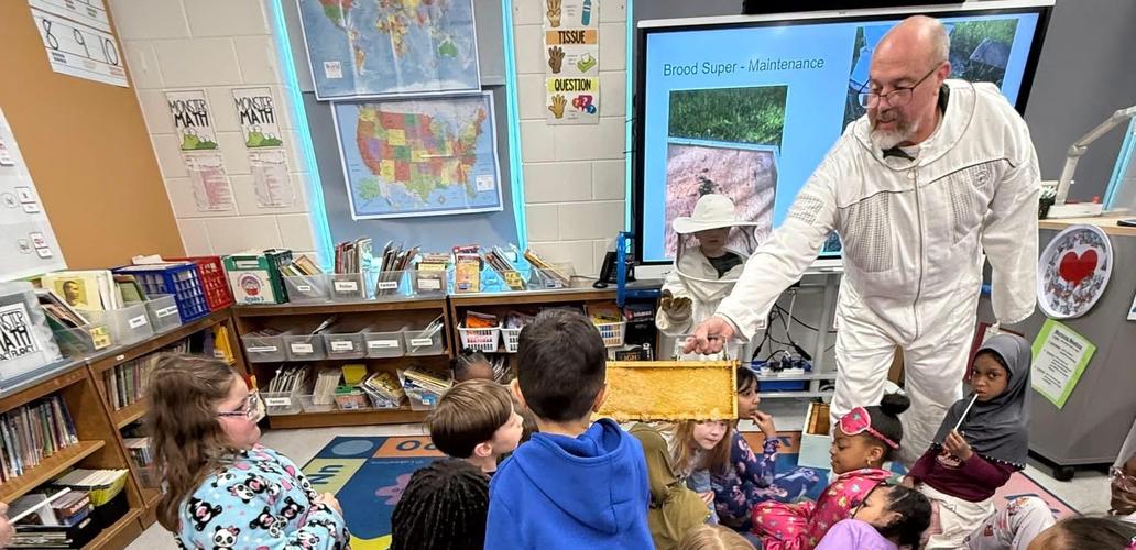 Superintendent Haynes came to teach 2nd grade students about bee keeping.