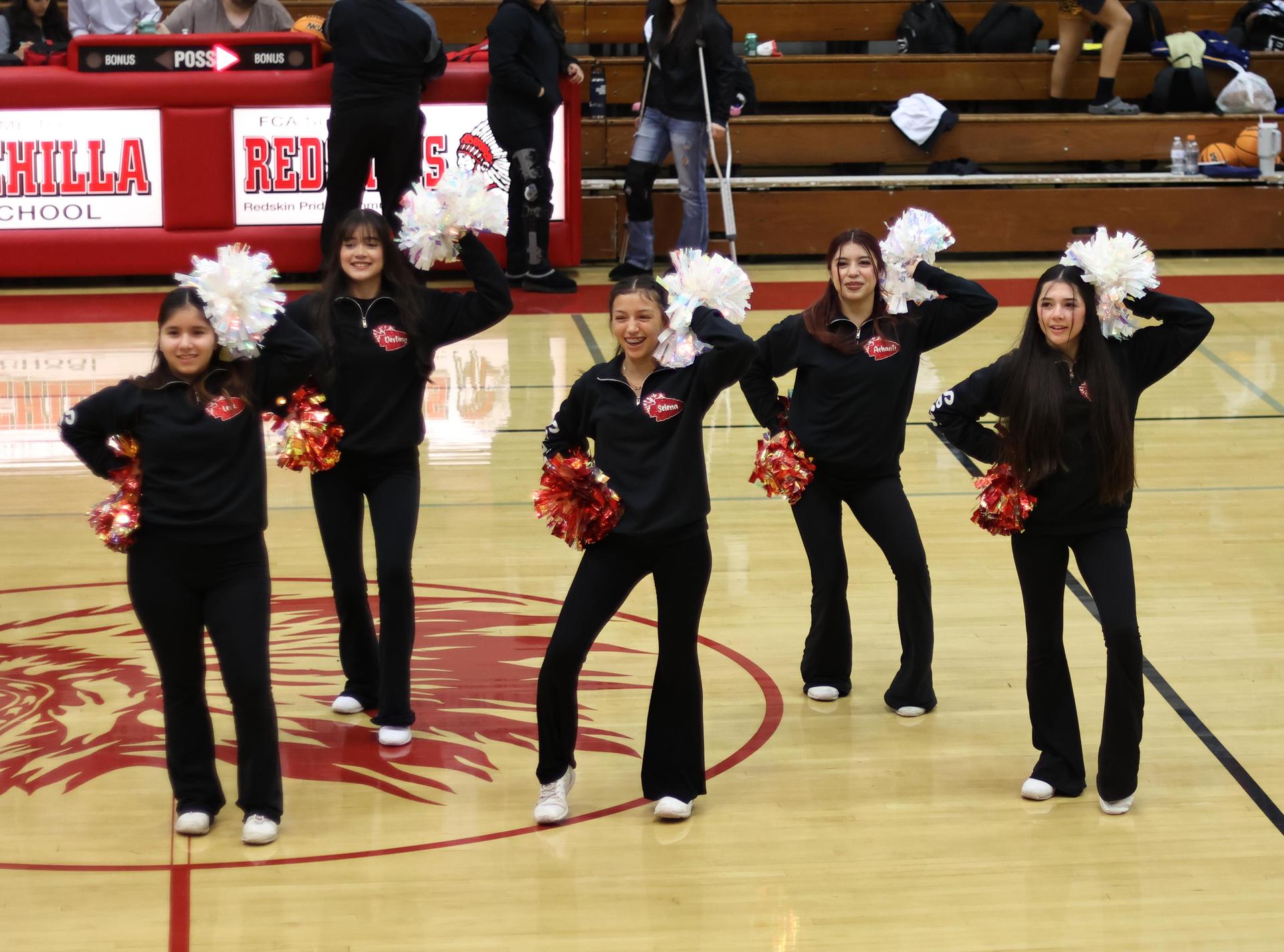 varsity cheerleaders in action
