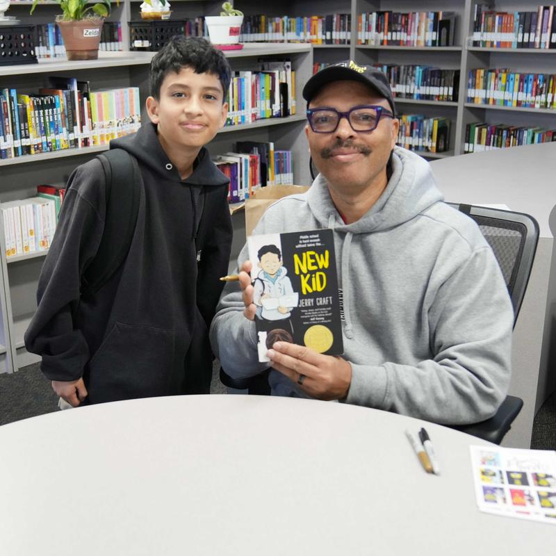 Student with Author Jerry Craft