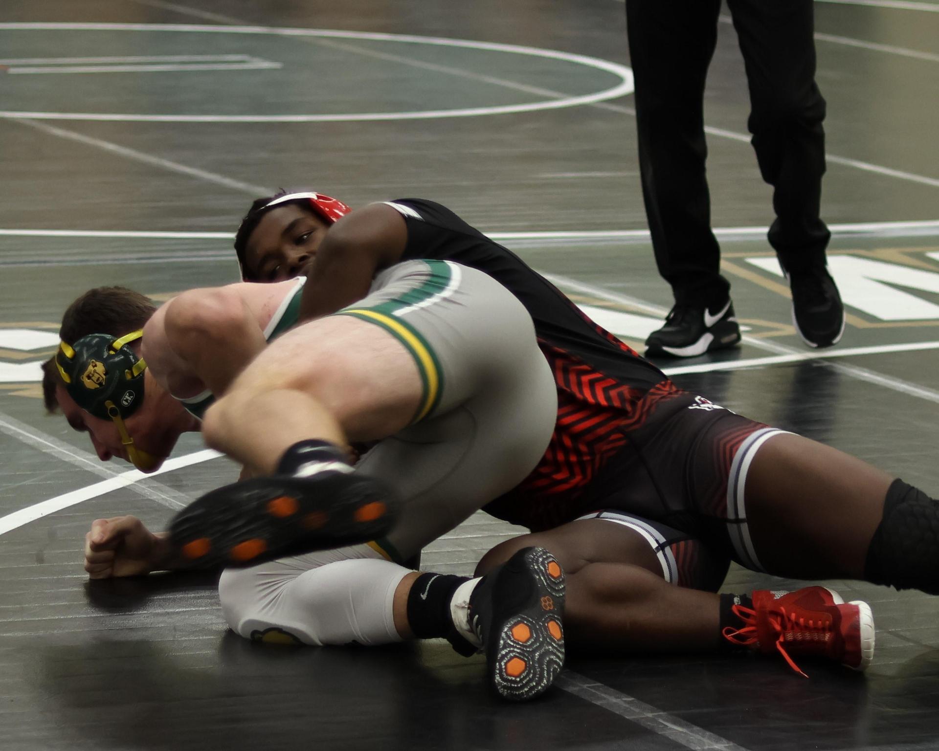 boys wrestling at liberty duals