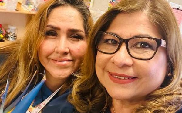 Two teachers side by side