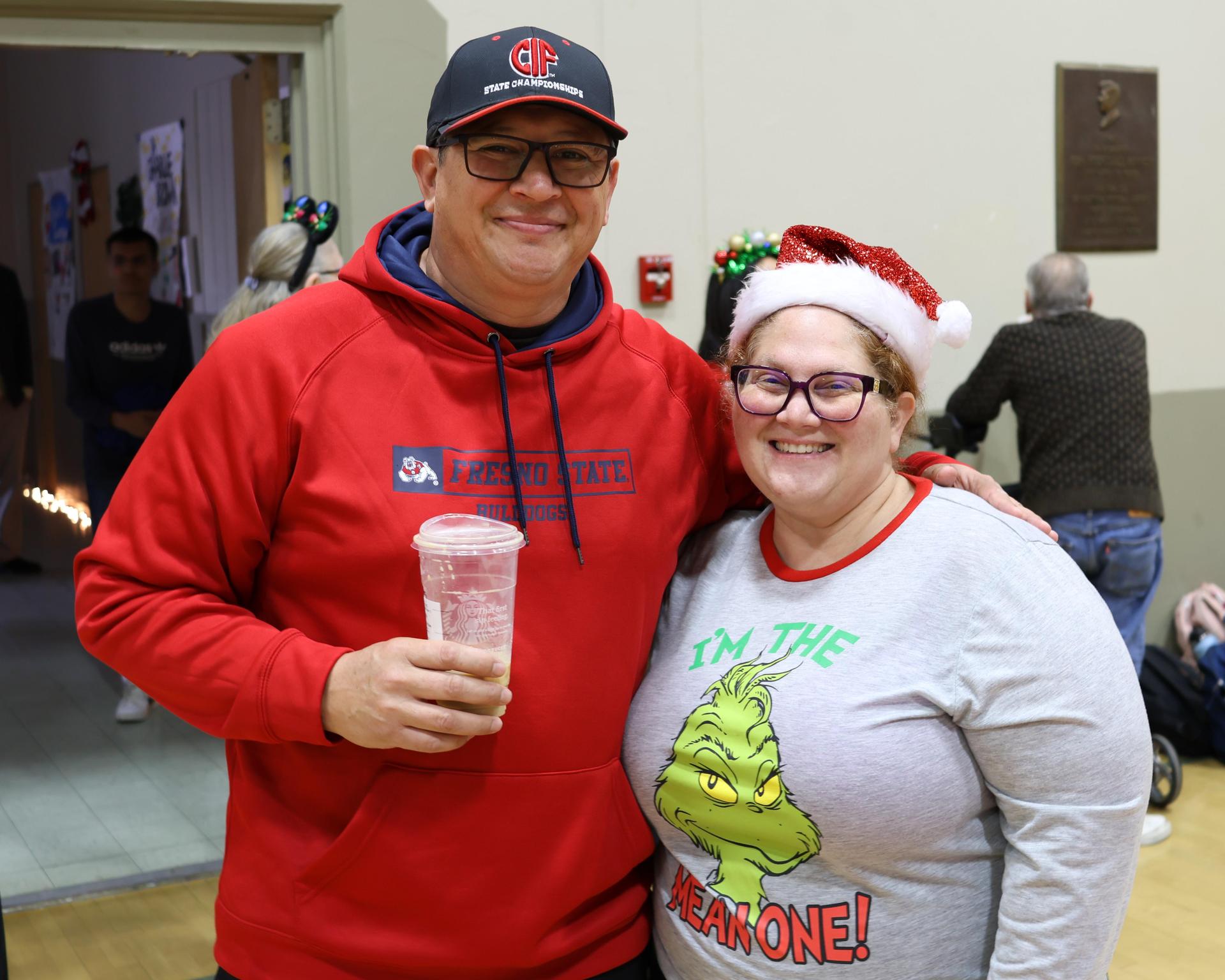 students and staff posing at the winter wishes rally
