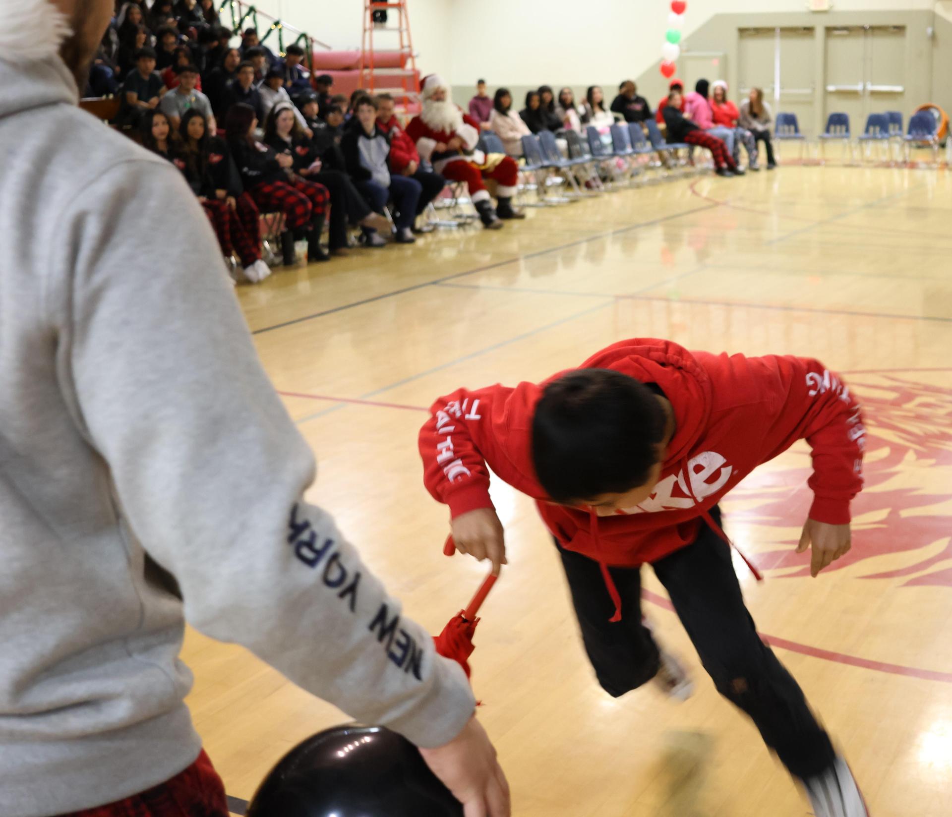 students playing the balloon pop game