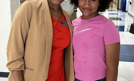 Assistant Principal Forney with student