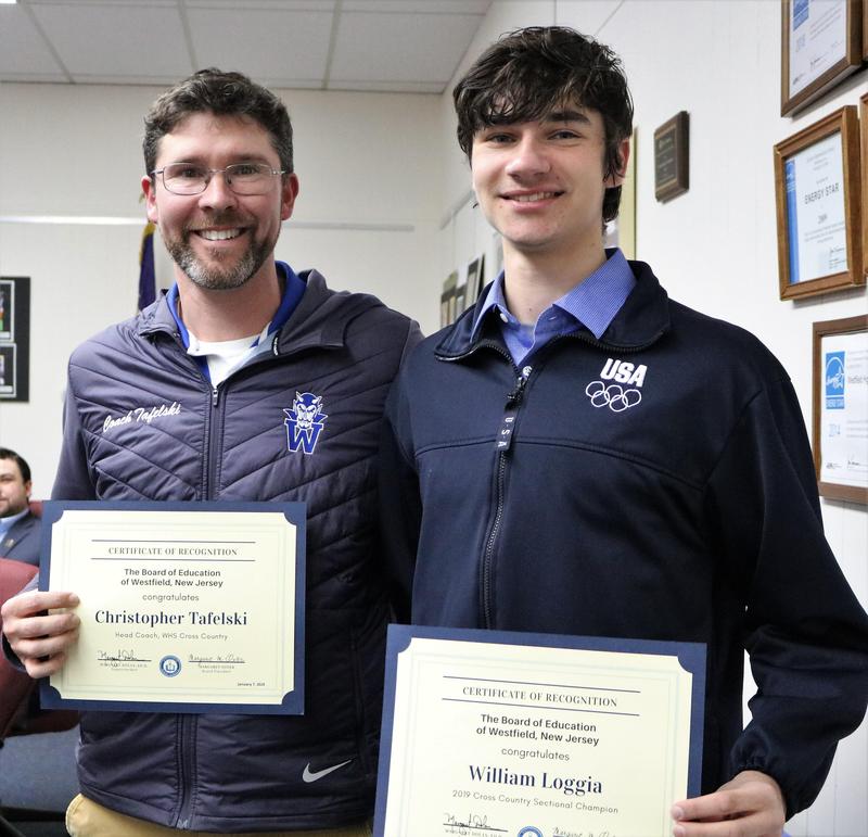 Photo of WHS student athlete and coach honored at Jan 7 Board of Education meeting.