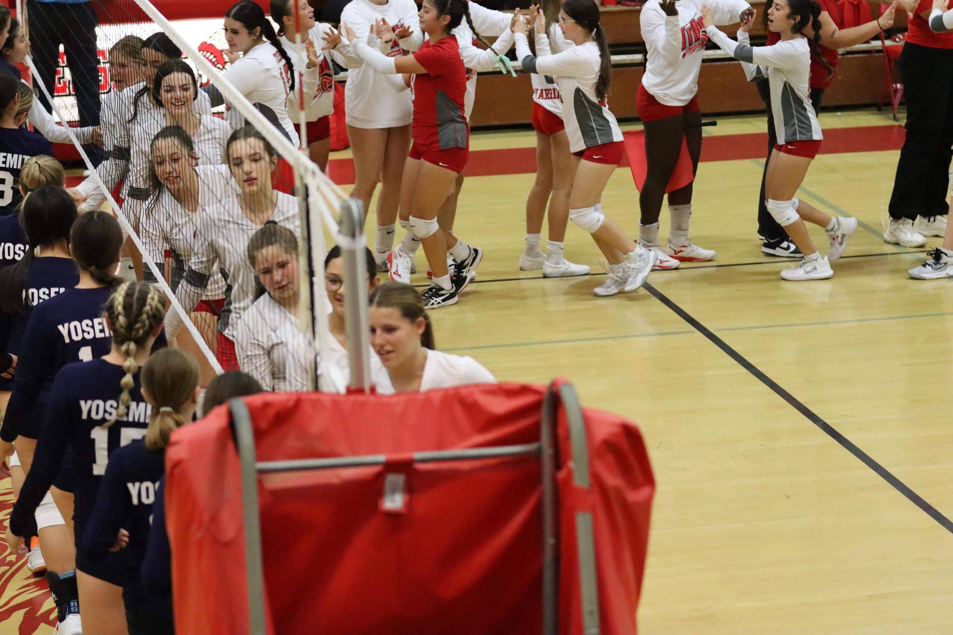 junior varsity girls playing volleyball against Yosemite