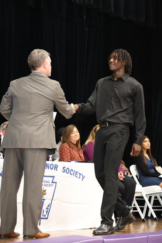 New NHS Members Receive Certificates from Mr. Wagner