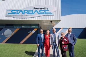Thought for 1sA group of district and CSBA leaders pose in front of the Porterville STARBASE facility during their campus tour.