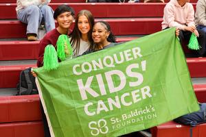 People shaving heads for cancer research