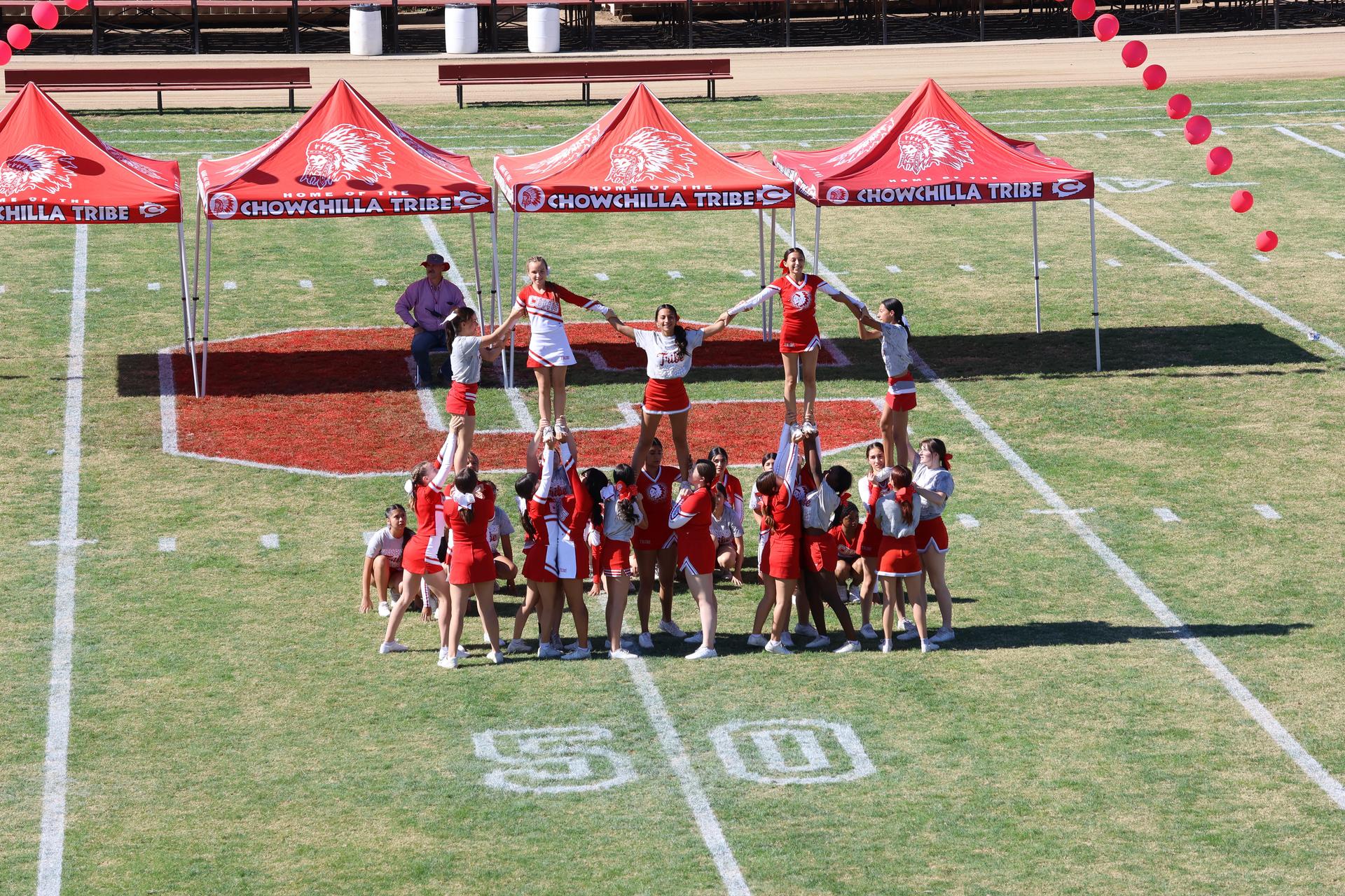 students and staff at the homecoming rally