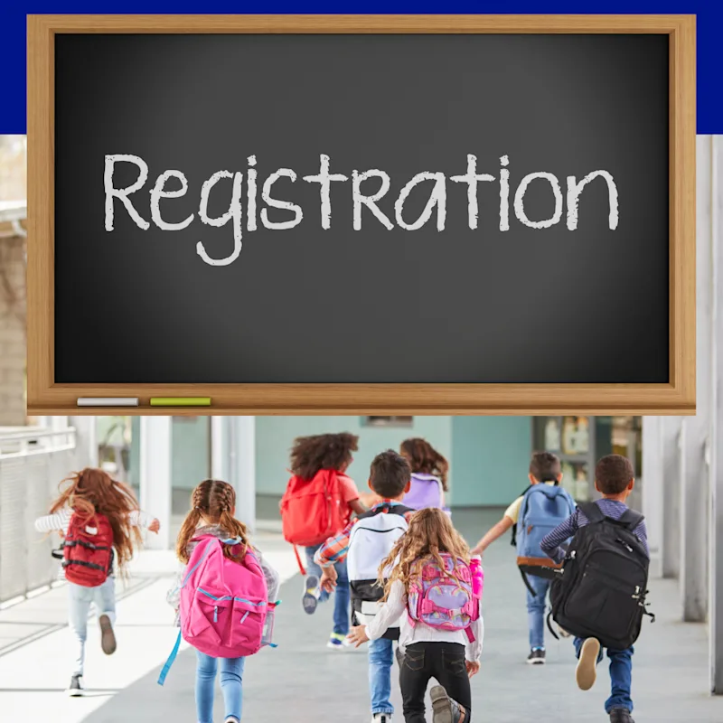  Students running with backpacks. Under a chalkboard that reads Registration
