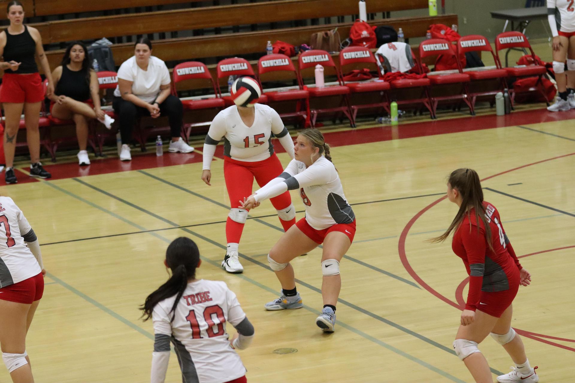 junior varsity girls playing volleyball against Liberty